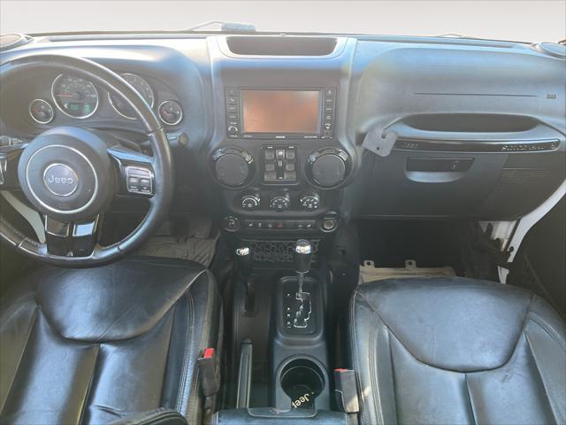 used 2015 Jeep Wrangler Unlimited car, priced at $20,874