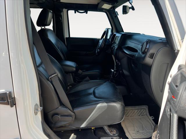 used 2015 Jeep Wrangler Unlimited car, priced at $20,874