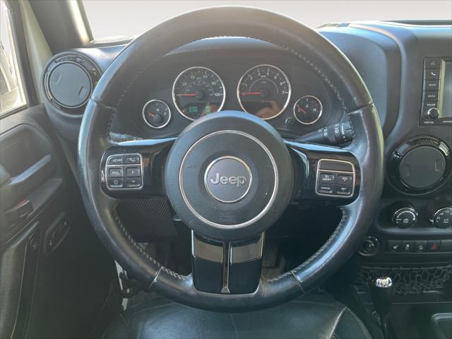 used 2015 Jeep Wrangler Unlimited car, priced at $20,874