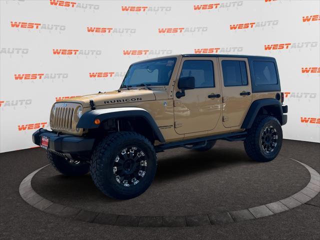 used 2014 Jeep Wrangler Unlimited car, priced at $17,096