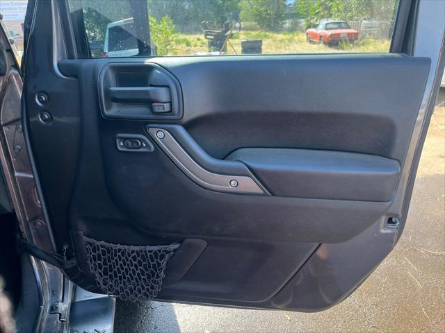 used 2016 Jeep Wrangler Unlimited car, priced at $21,242