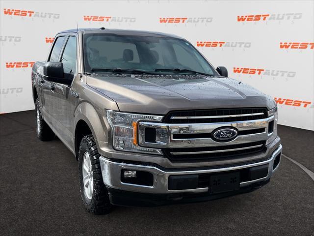 used 2018 Ford F-150 car, priced at $23,221