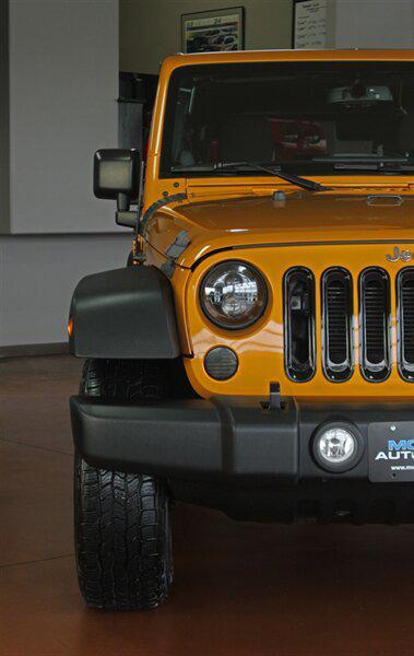 used 2014 Jeep Wrangler Unlimited car, priced at $17,886