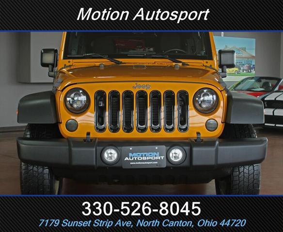 used 2014 Jeep Wrangler Unlimited car, priced at $17,886