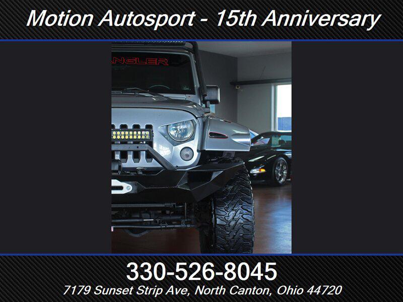 used 2014 Jeep Wrangler Unlimited car, priced at $21,989