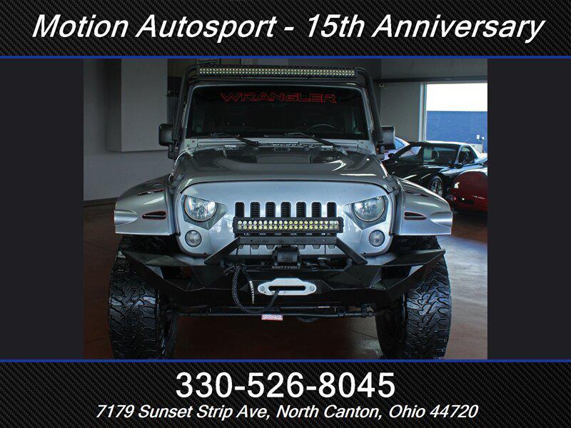 used 2014 Jeep Wrangler Unlimited car, priced at $21,989