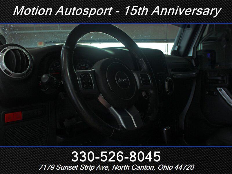 used 2014 Jeep Wrangler Unlimited car, priced at $21,989