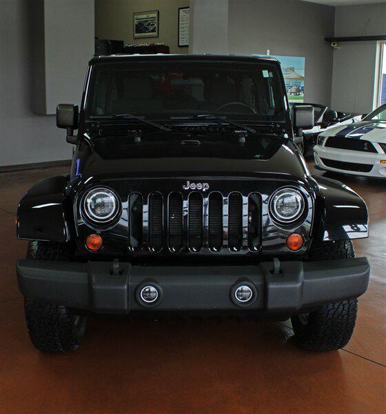 used 2012 Jeep Wrangler Unlimited car, priced at $21,978