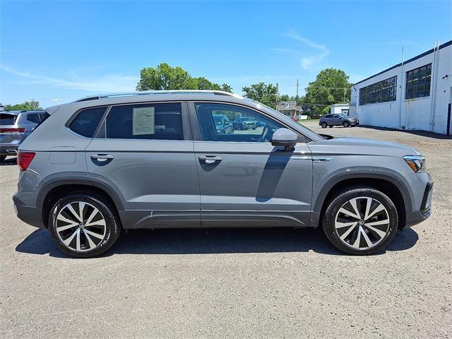 used 2023 Volkswagen Taos car, priced at $22,118