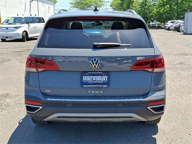 used 2023 Volkswagen Taos car, priced at $22,118