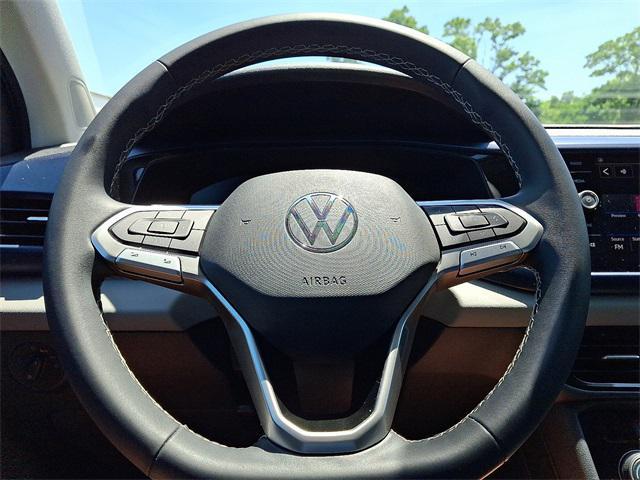 used 2023 Volkswagen Taos car, priced at $22,118