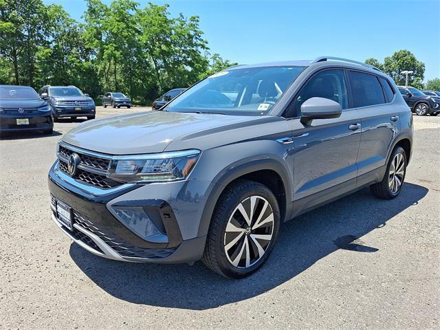 used 2023 Volkswagen Taos car, priced at $22,118