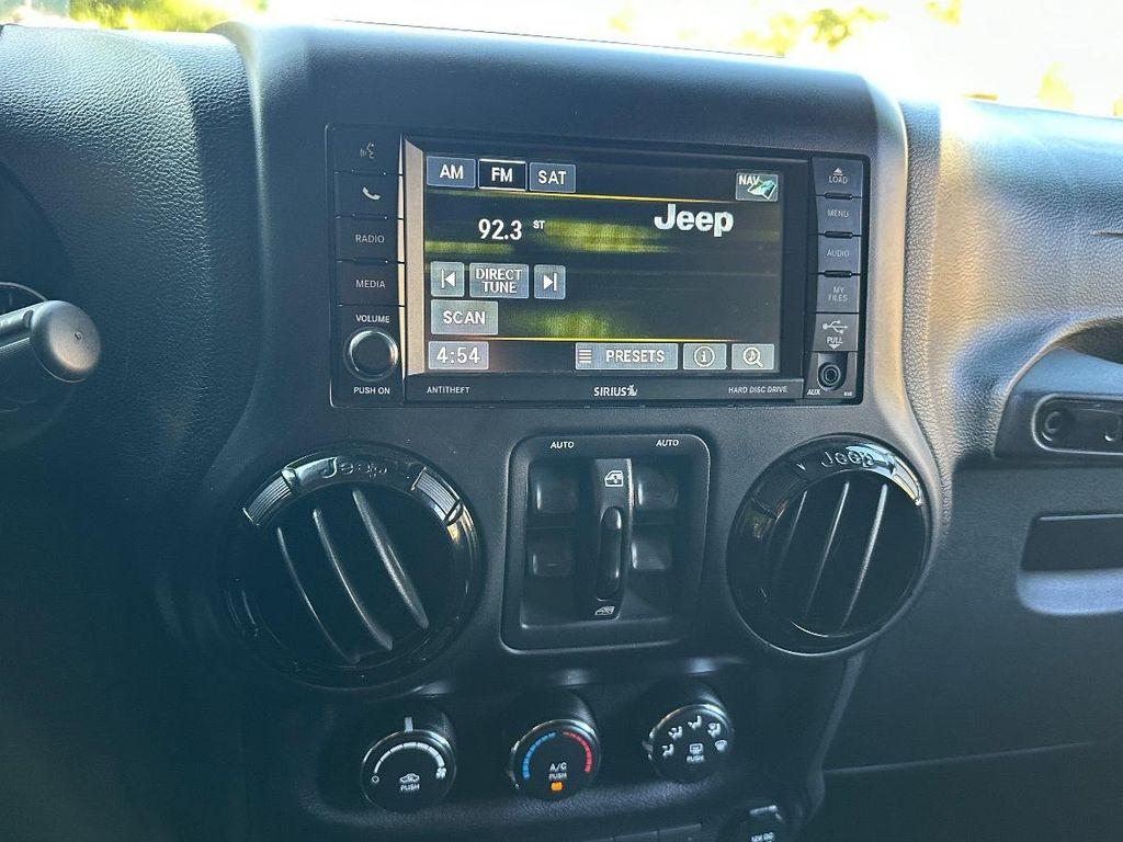 used 2014 Jeep Wrangler Unlimited car, priced at $18,100