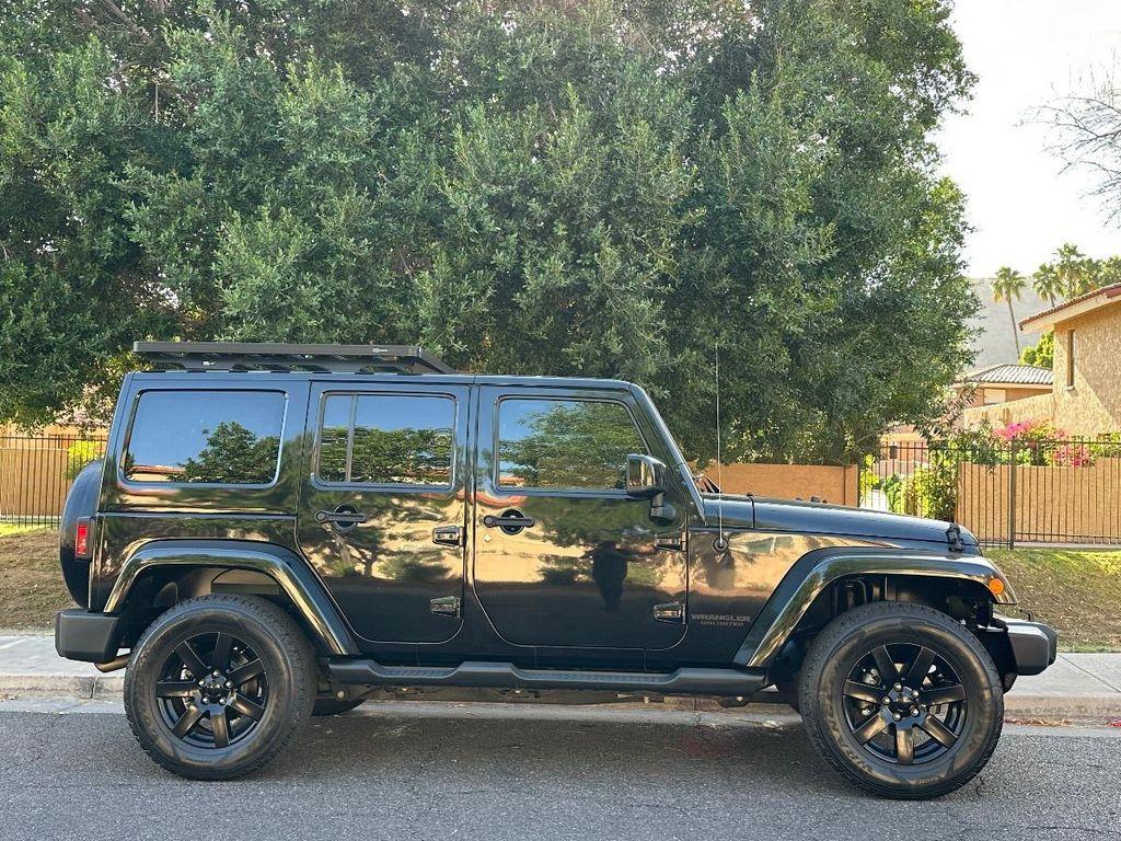 used 2014 Jeep Wrangler Unlimited car, priced at $18,100
