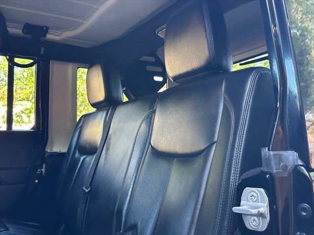 used 2014 Jeep Wrangler Unlimited car, priced at $21,400
