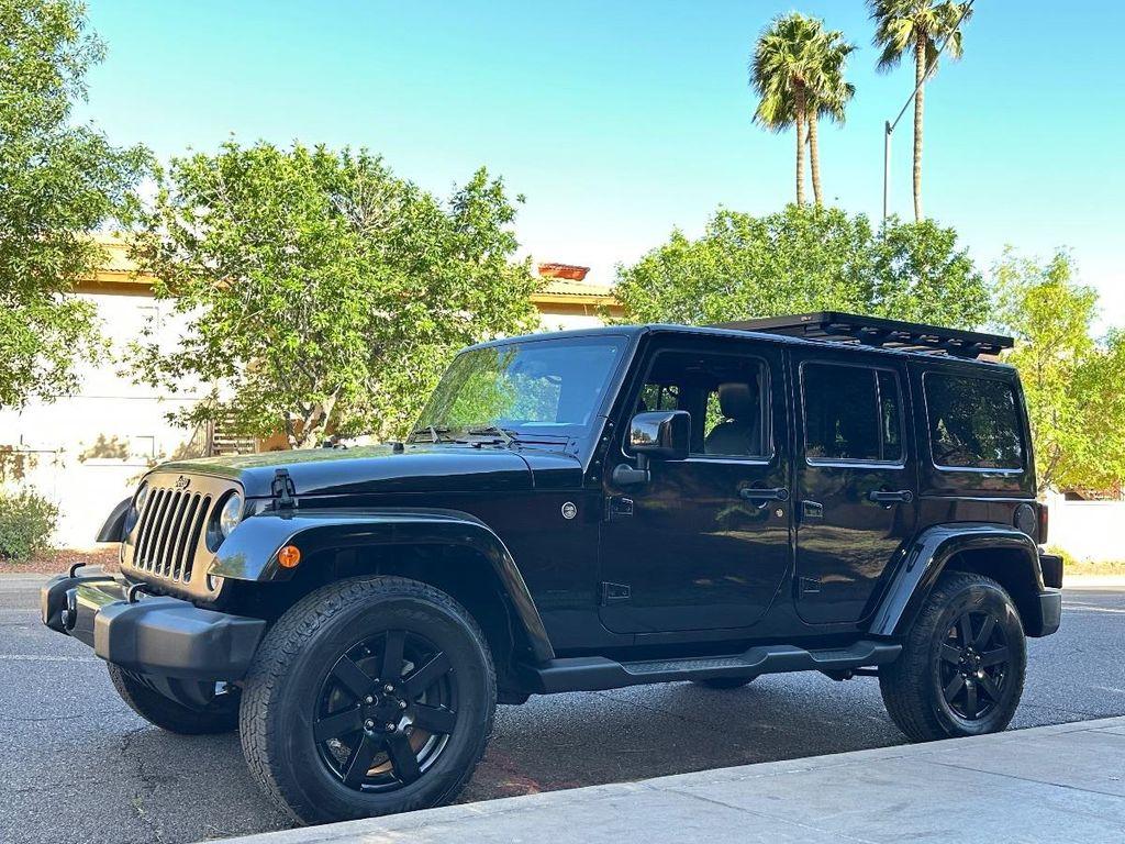 used 2014 Jeep Wrangler Unlimited car, priced at $18,100