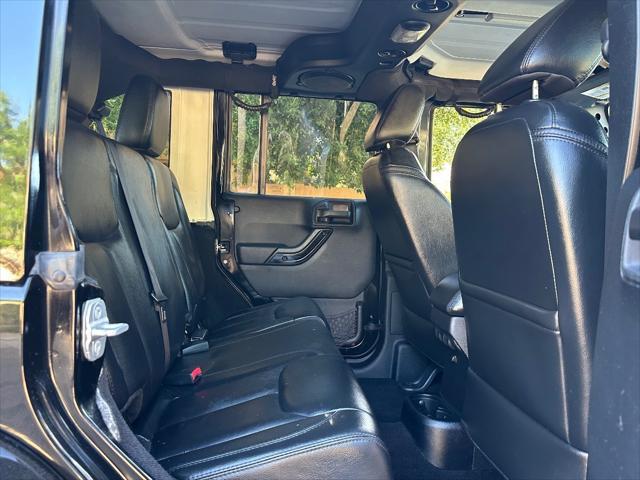 used 2014 Jeep Wrangler Unlimited car, priced at $21,400