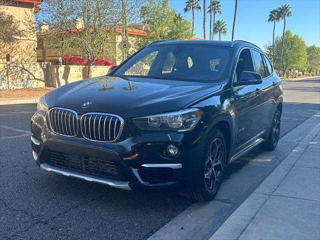 used 2018 BMW X1 car, priced at $13,600