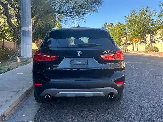 used 2018 BMW X1 car, priced at $13,600