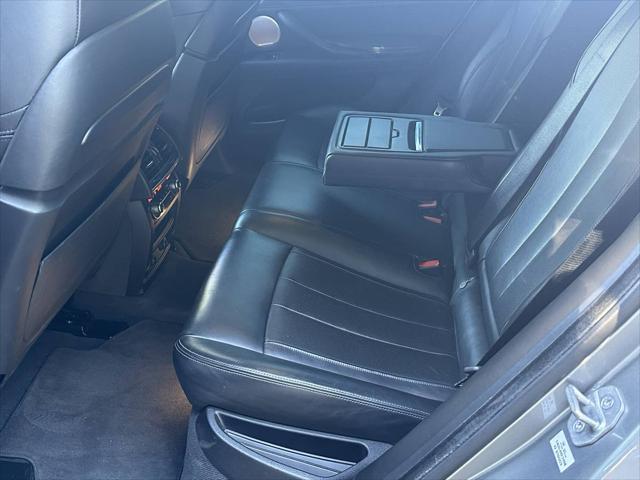 used 2016 BMW X6 M car, priced at $25,900