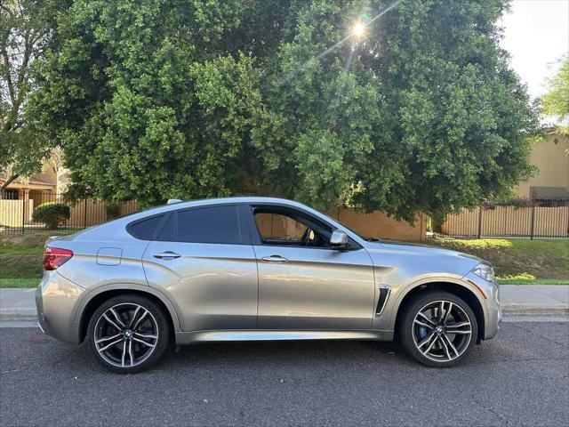 used 2016 BMW X6 M car, priced at $25,900