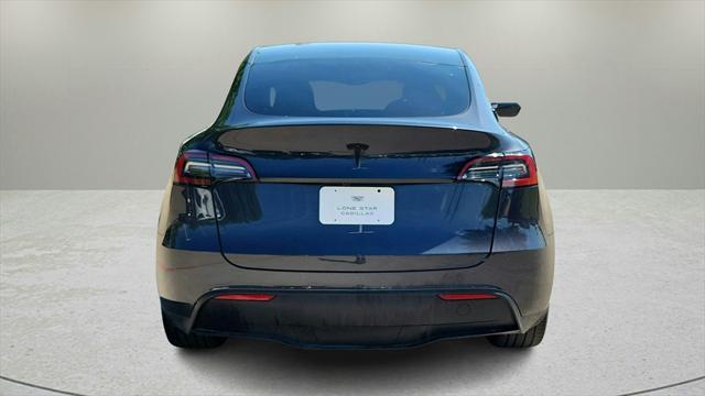 used 2024 Tesla Model Y car, priced at $34,000