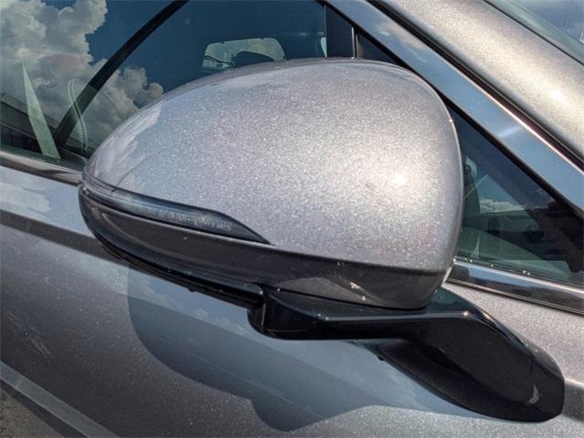used 2023 Genesis GV70 car, priced at $48,237
