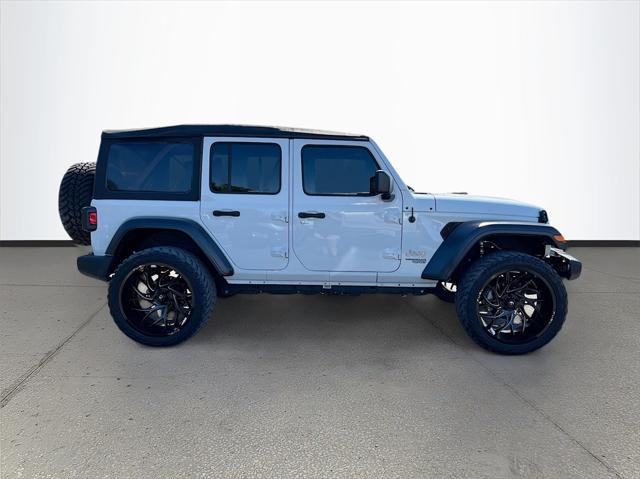 used 2021 Jeep Wrangler Unlimited car, priced at $25,591