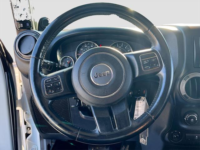 used 2014 Jeep Wrangler Unlimited car, priced at $15,033