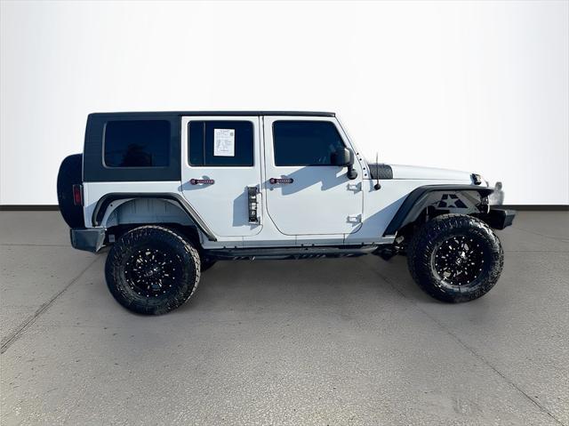 used 2014 Jeep Wrangler Unlimited car, priced at $15,033