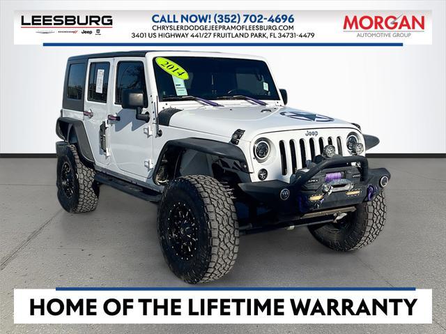 used 2014 Jeep Wrangler Unlimited car, priced at $15,033