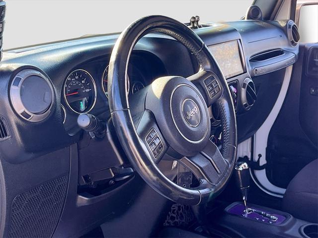 used 2014 Jeep Wrangler Unlimited car, priced at $15,033