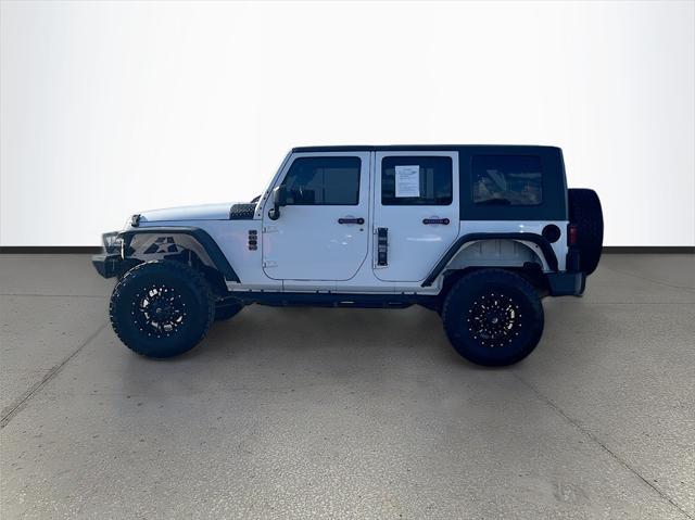 used 2014 Jeep Wrangler Unlimited car, priced at $15,033