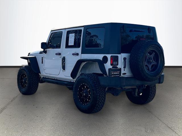 used 2014 Jeep Wrangler Unlimited car, priced at $15,033