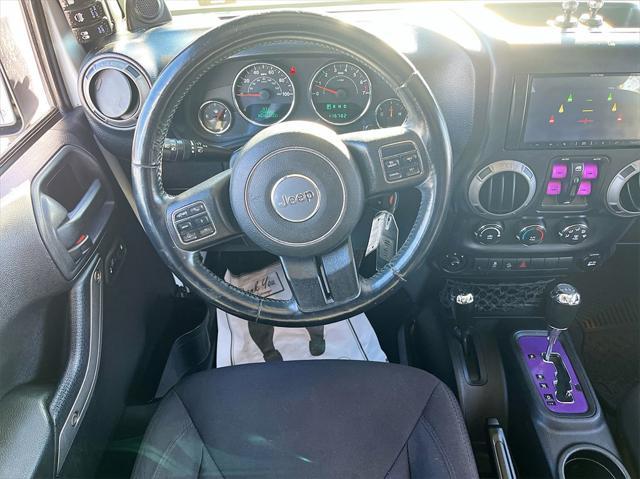 used 2014 Jeep Wrangler Unlimited car, priced at $15,033