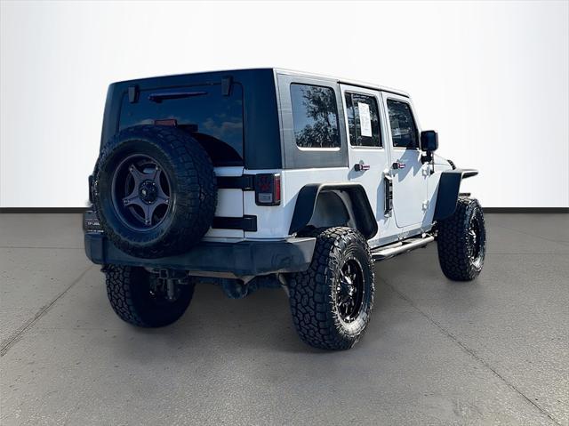 used 2014 Jeep Wrangler Unlimited car, priced at $15,033