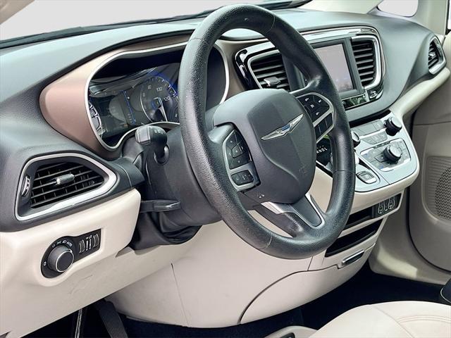 used 2021 Chrysler Voyager car, priced at $17,533