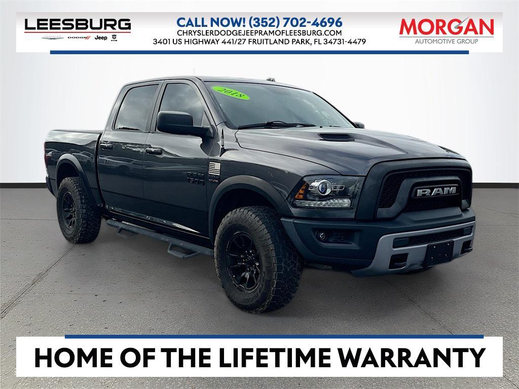 used 2018 Ram 1500 car, priced at $28,602