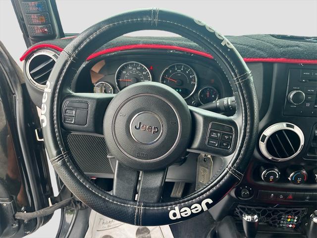 used 2015 Jeep Wrangler Unlimited car, priced at $21,990