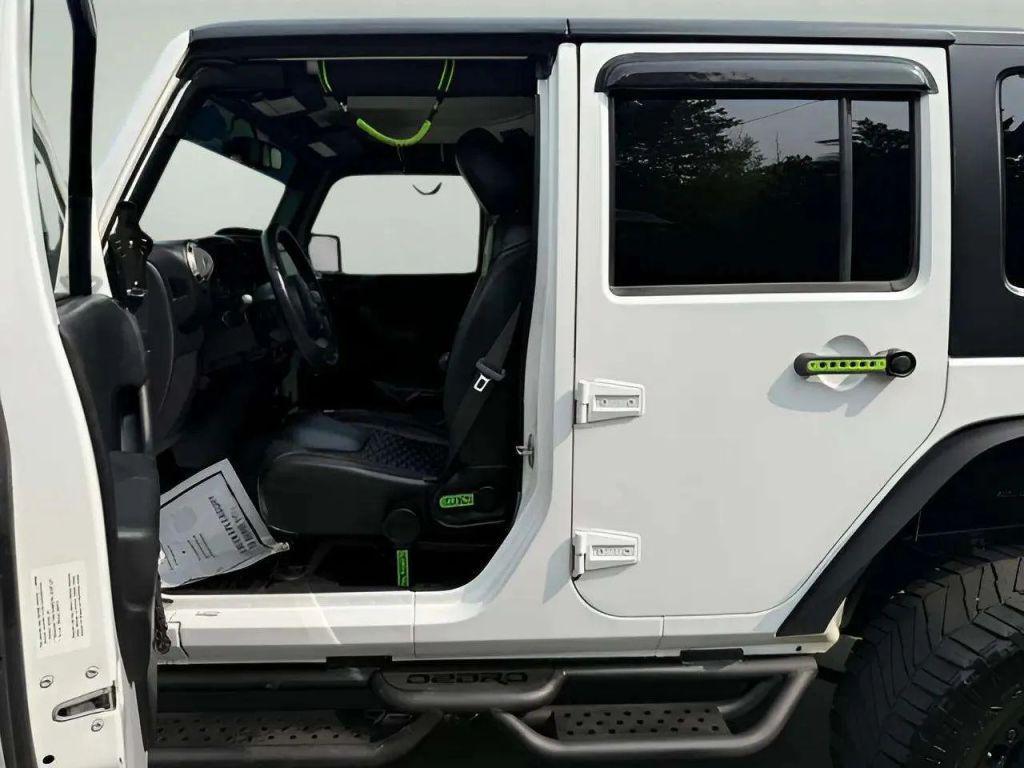 used 2014 Jeep Wrangler Unlimited car, priced at $14,880