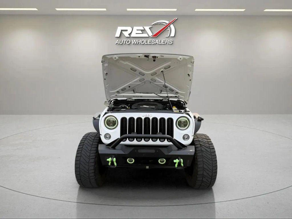 used 2014 Jeep Wrangler Unlimited car, priced at $14,880