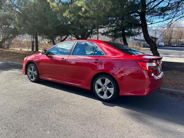 used 2014 Toyota Camry car, priced at $8,990