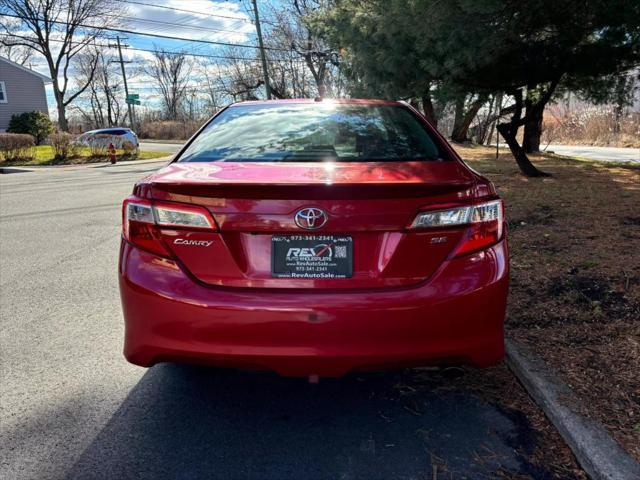 used 2014 Toyota Camry car, priced at $8,990