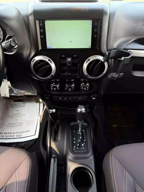 used 2015 Jeep Wrangler Unlimited car, priced at $15,880