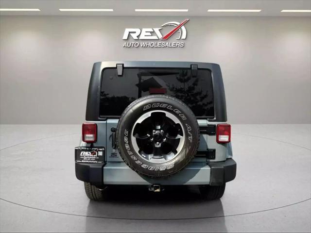 used 2015 Jeep Wrangler Unlimited car, priced at $15,880
