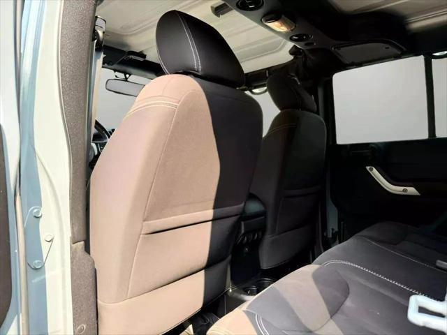 used 2015 Jeep Wrangler Unlimited car, priced at $15,880