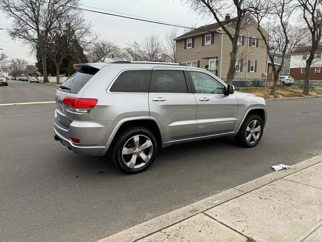 used 2014 Jeep Grand Cherokee car, priced at $14,695