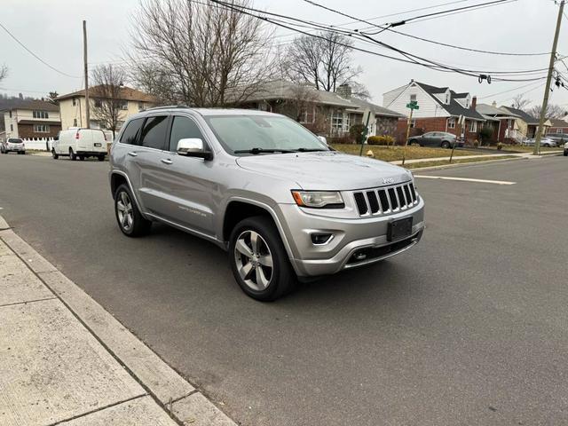 used 2014 Jeep Grand Cherokee car, priced at $14,695