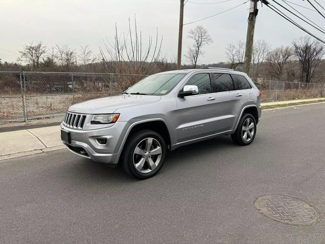 used 2014 Jeep Grand Cherokee car, priced at $14,695