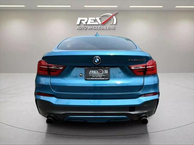 used 2016 BMW X4 car, priced at $21,480